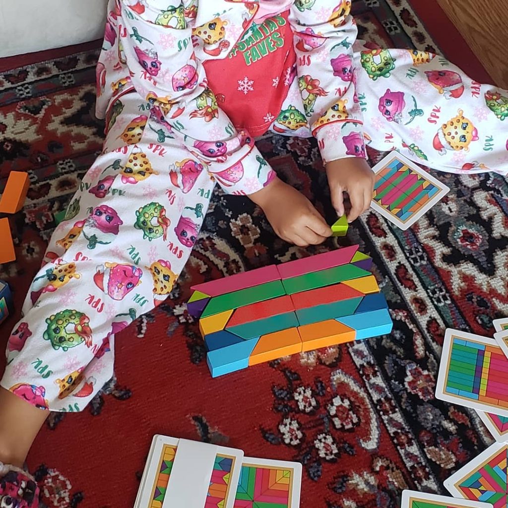 girl playing with blocks