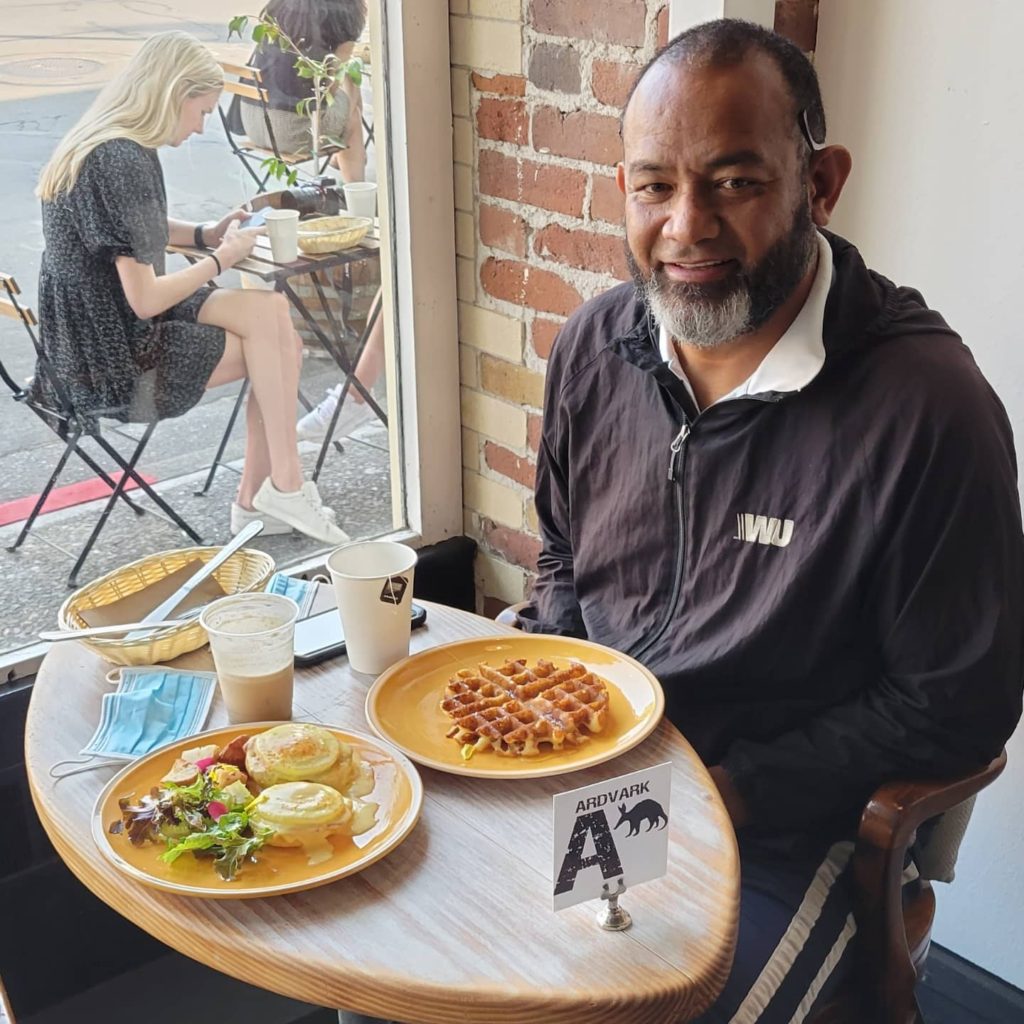 man eating breakfast