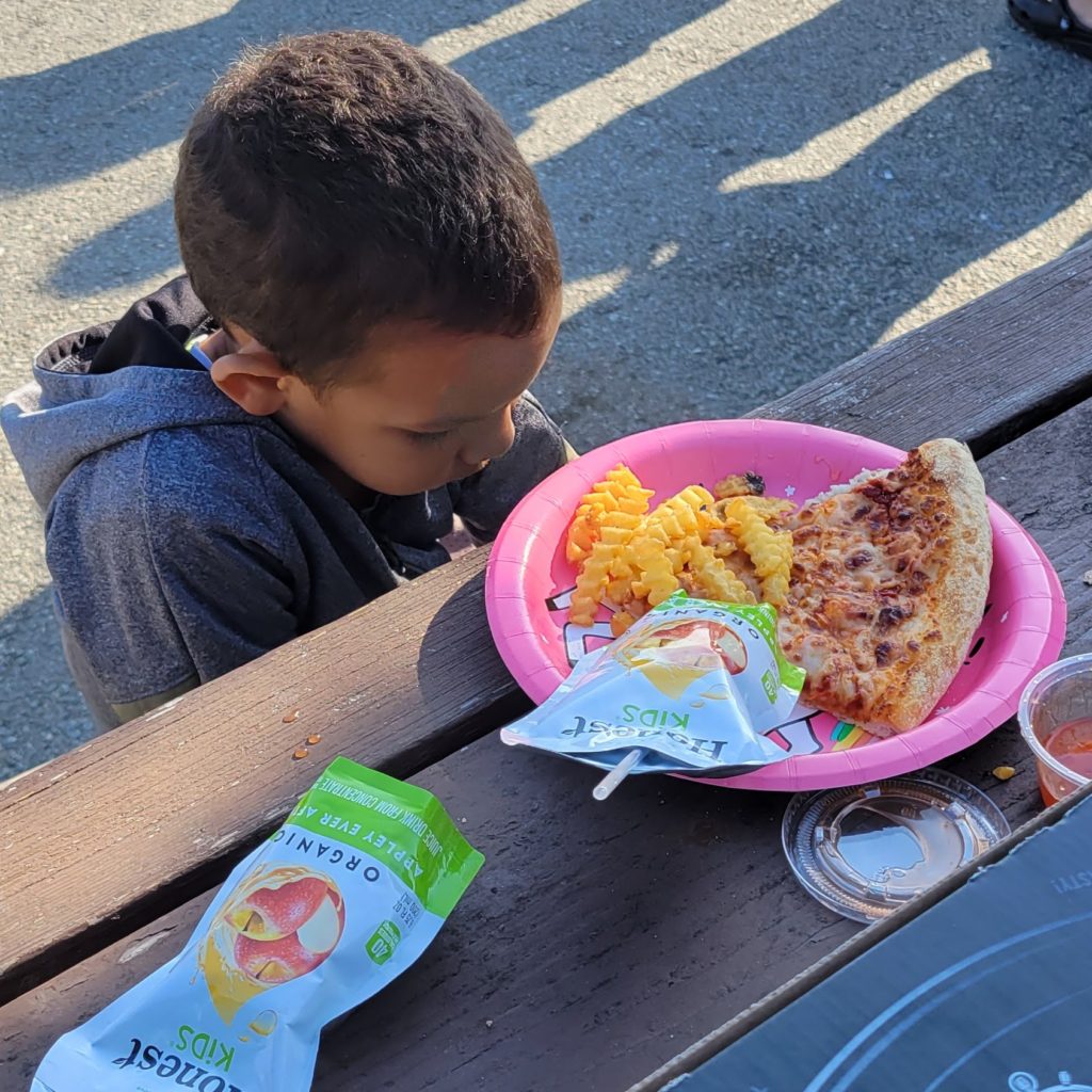 boy eating pizza