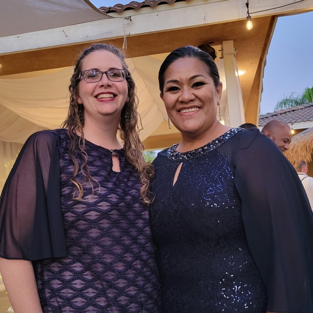 two women in formal clothes