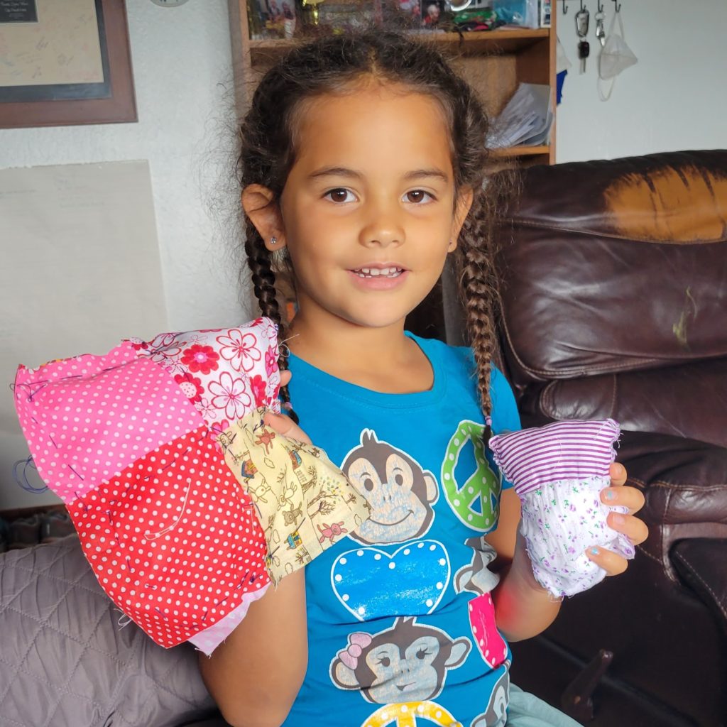 little girl with crafts