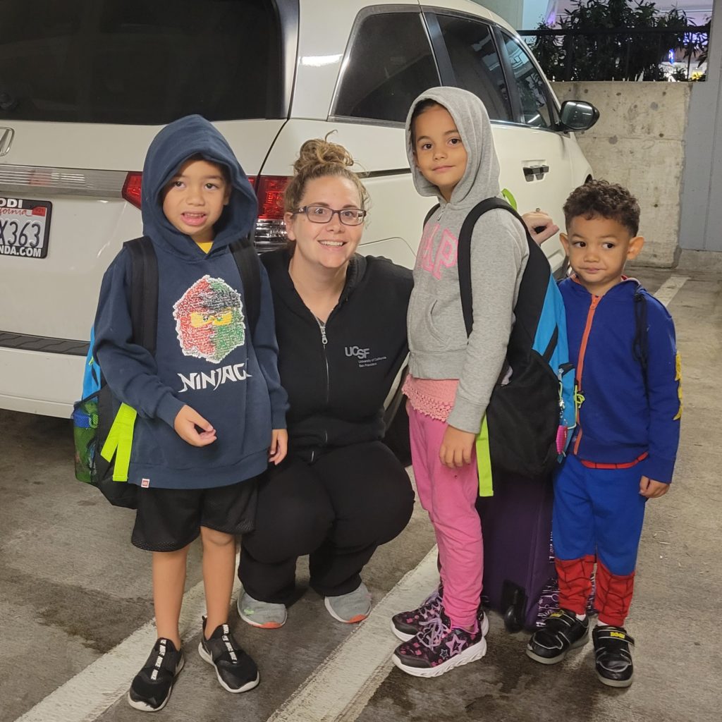 mom and kids at airport