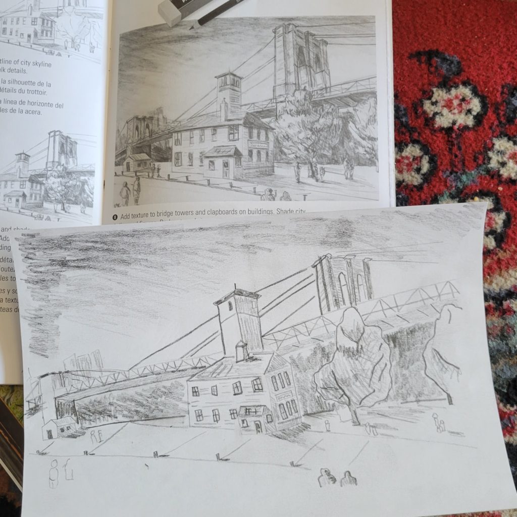 printed picture of building with larger sketch of it