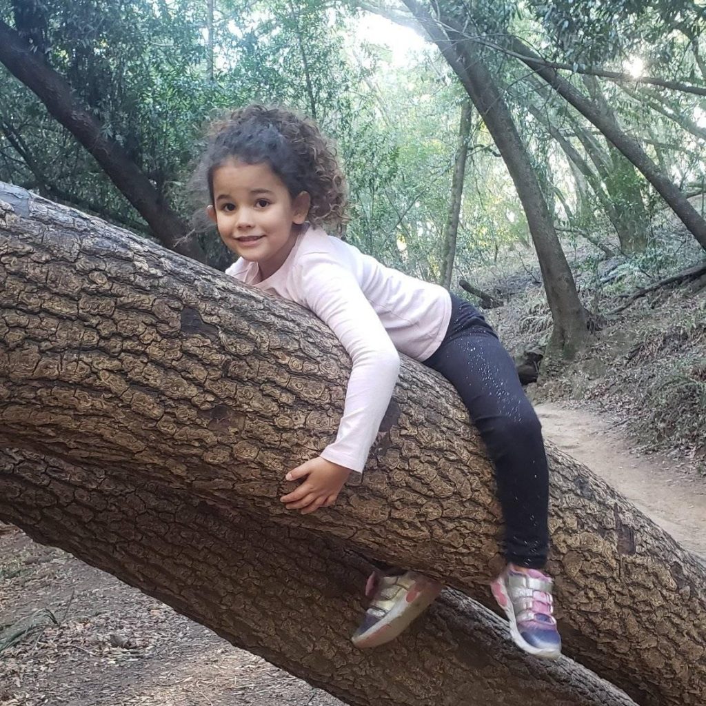 girl on tree branch