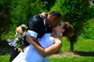 bride and groom kissing