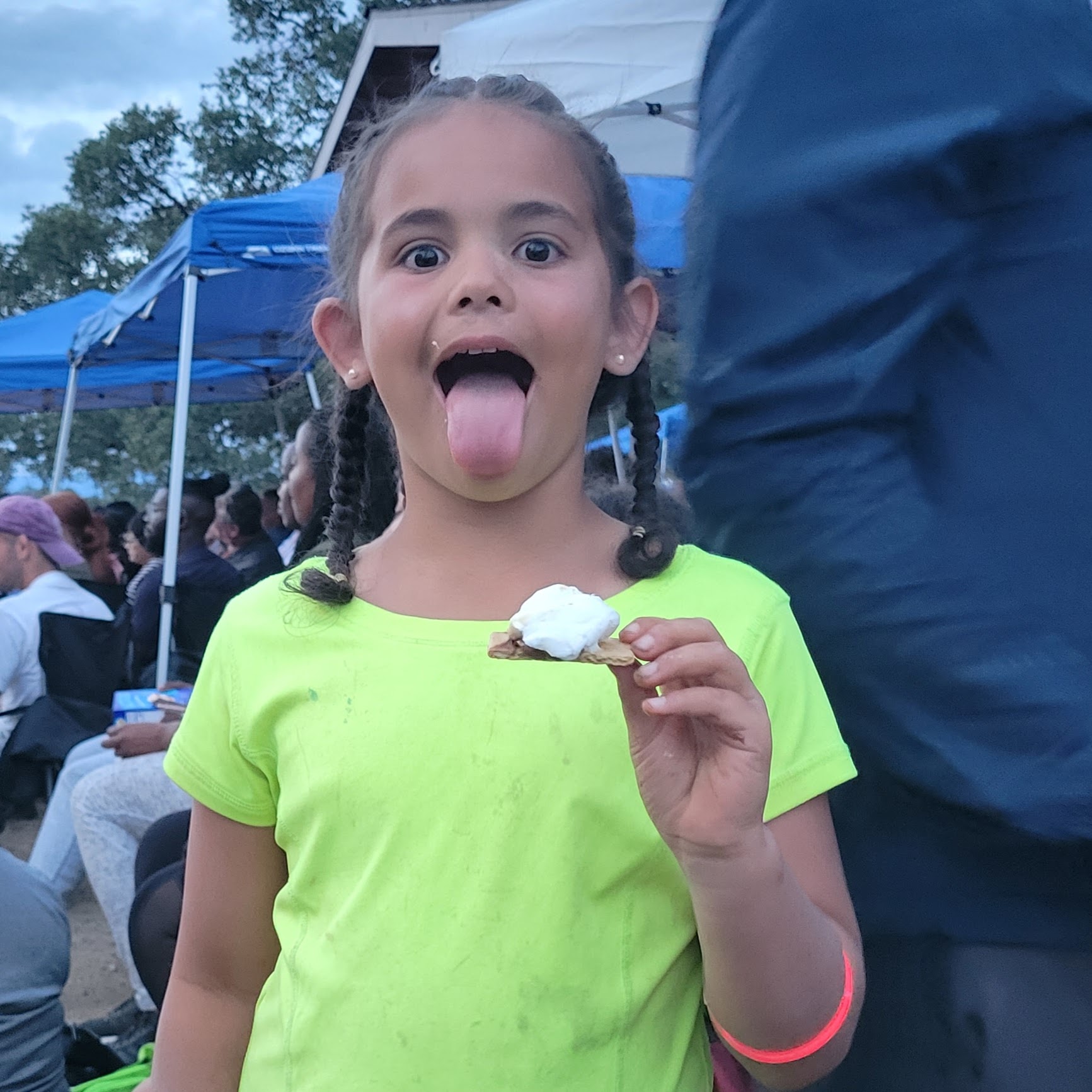 Girl with smore and tongue out