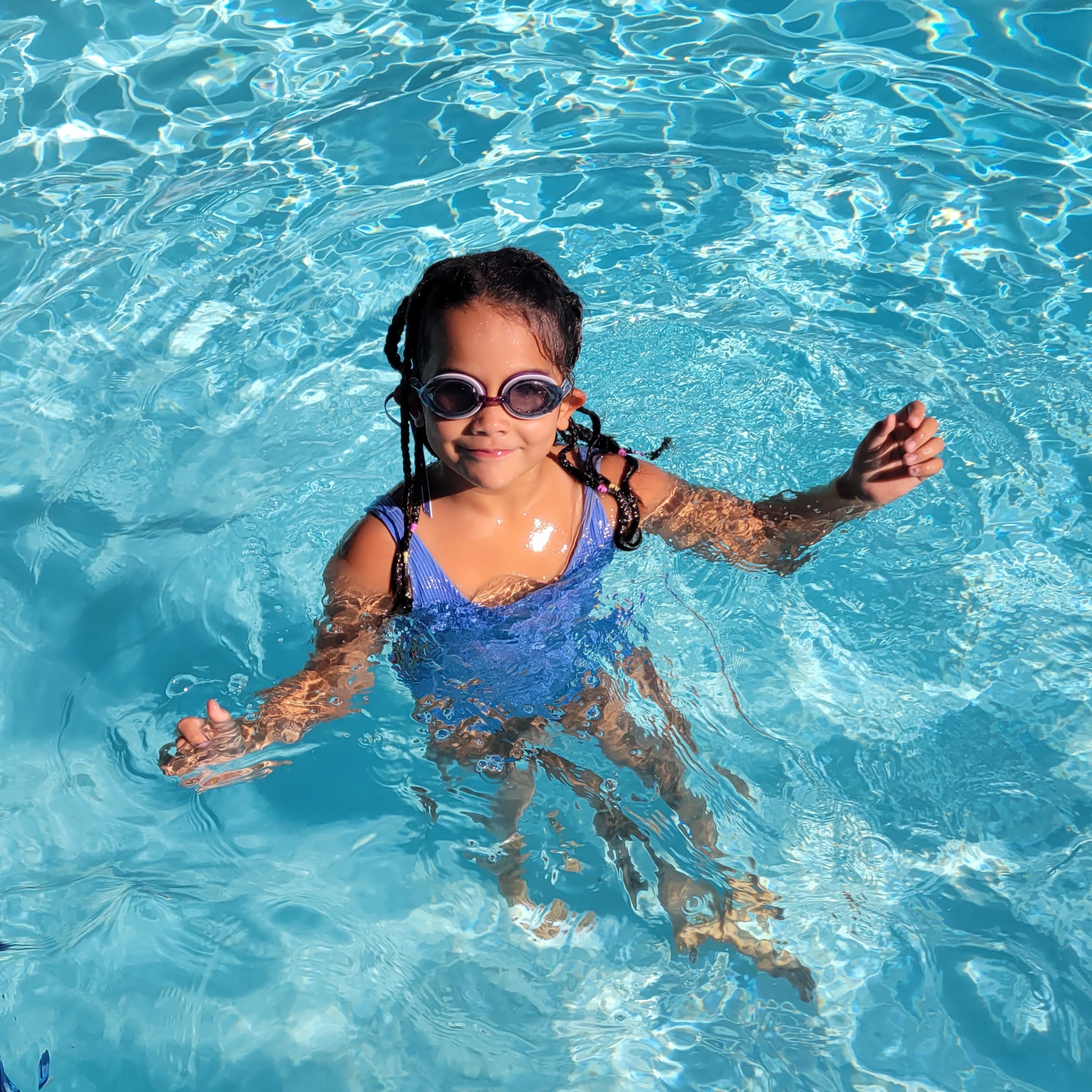 young girl swimming