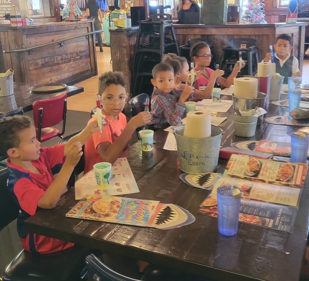 six kids getting socialization at joe's crab shack